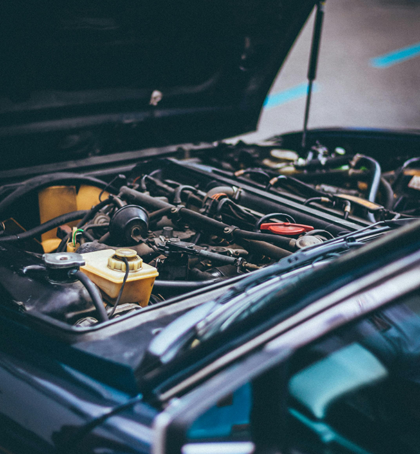 mechanic working on car brake job